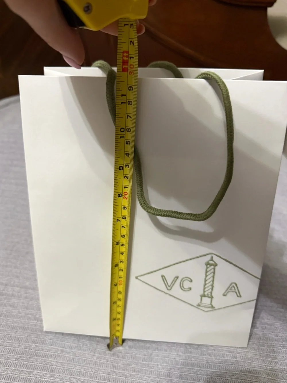 Van Cleef & Arpels White Gift Bag with Green Handles